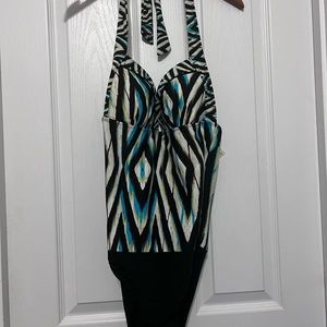 Leilani one piece swimsuit with halter ties around the neck. Size 10